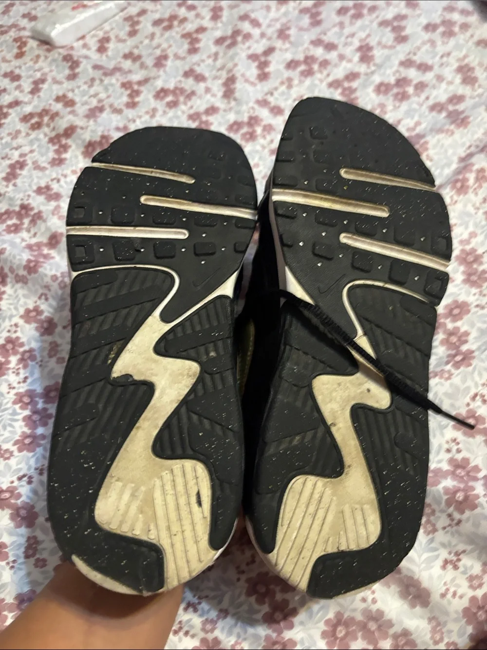 Nike Women's Black Sneakers with Subtle Gold Accent